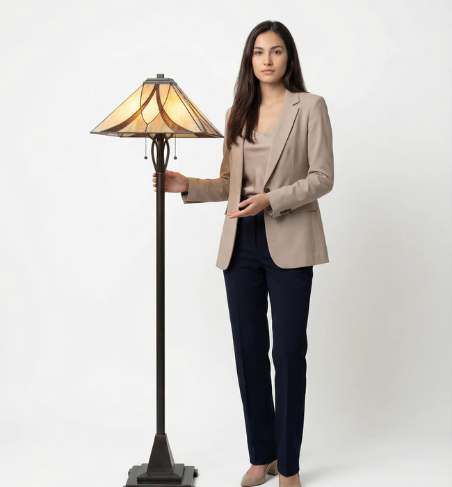 Woman in blazer with floor lamp