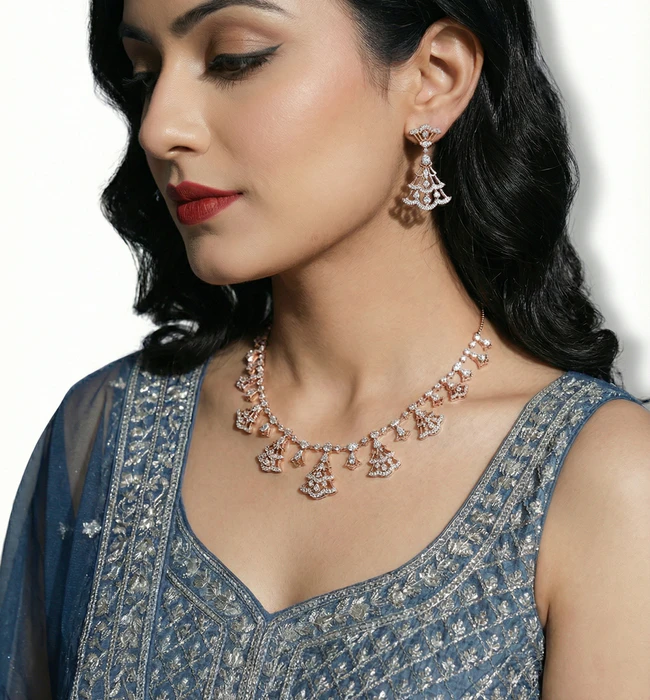 Diamond necklace and earrings set on model